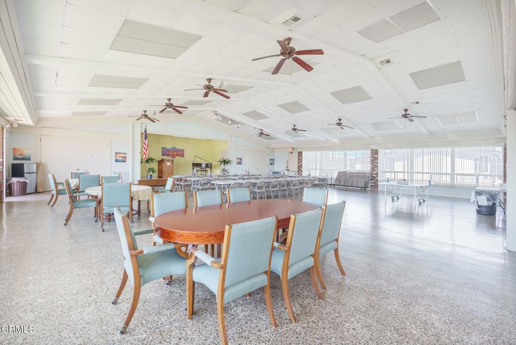 5540 West 5th Street, Unit 1 Oxnard, CA 93035 - Photo 33 of 35 a dining room with kitchen view and living room view