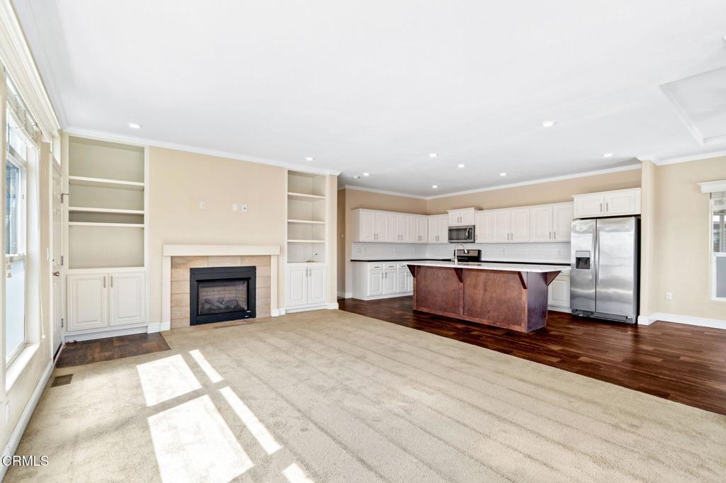5540 West 5th Street, Unit 1 Oxnard, CA 93035 - Photo 8 of 35 a view of kitchen with sink and wooden floor