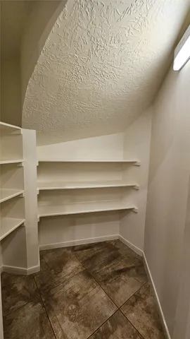 a view of a room with a shelf