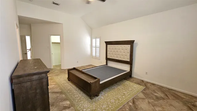 a living room with a couch and a table