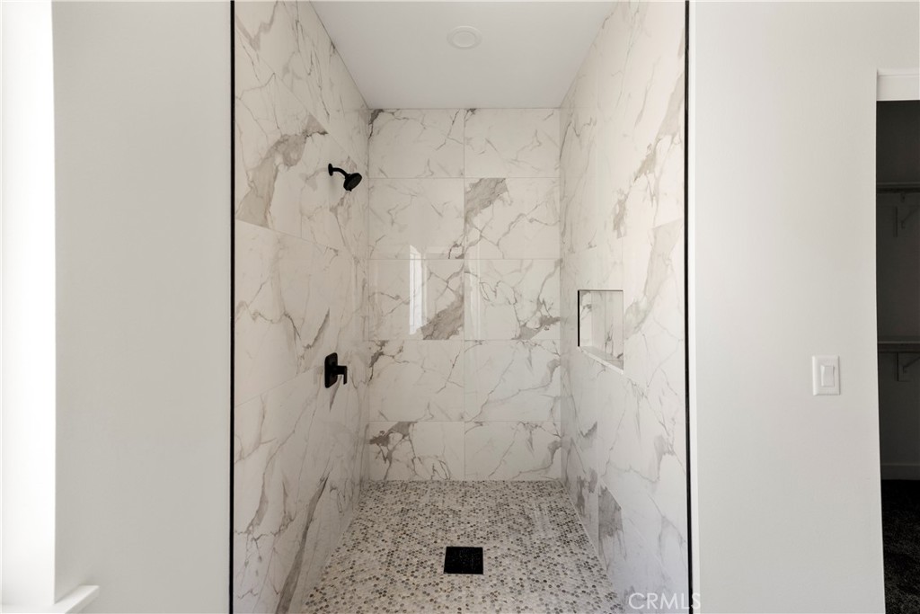 22324 Rancho Street Apple Valley, CA 92308 - Photo 29 of 47 a bathroom with a shower