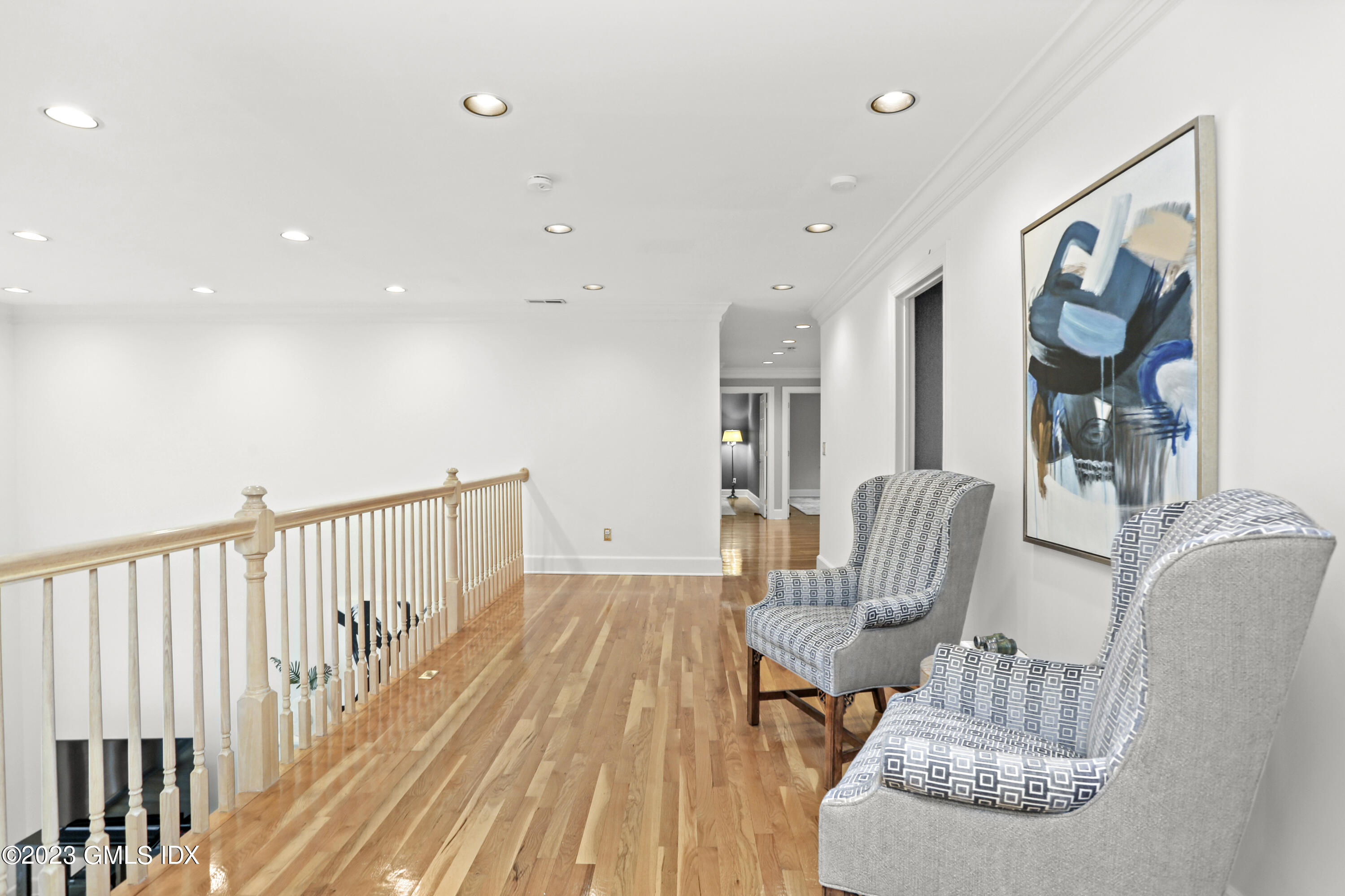 12 Juniper Hill Road Greenwich, CT 06830 - Photo 25 of 61 a living room with furniture and wooden floor