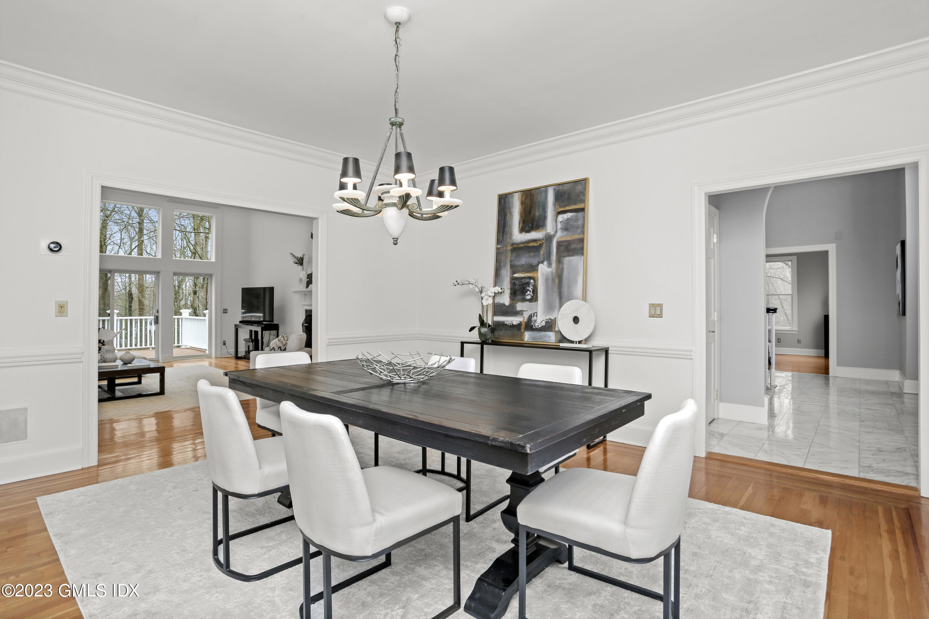 12 Juniper Hill Road Greenwich, CT 06830 - Photo 8 of 61 a dining room with furniture and wooden floor