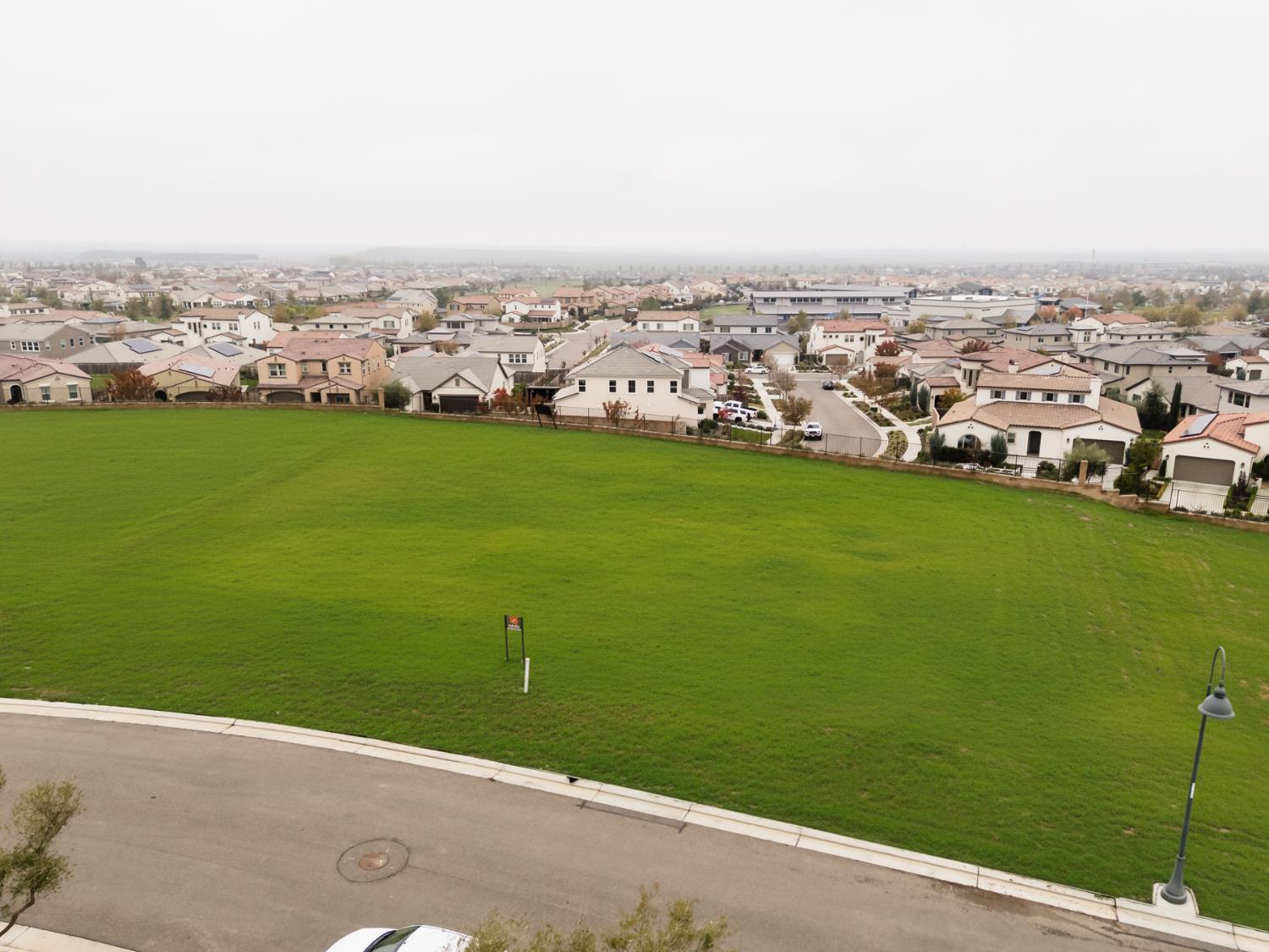 902 Terrace Place Madera, CA 93636 - Photo 2 of 3 an aerial view of a city with lots of residential buildings
