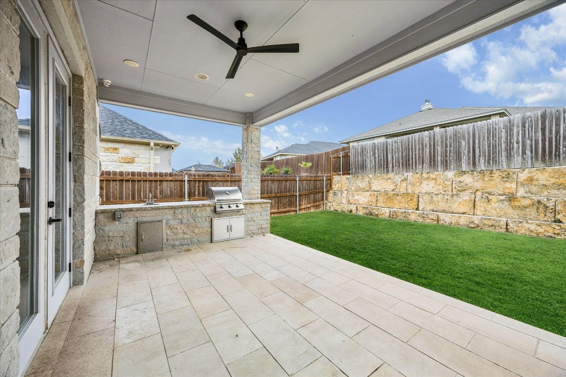 136 Greg Lane Jarrell, TX 76537 - Photo 9 of 10 a view of a porch with furniture and garden
