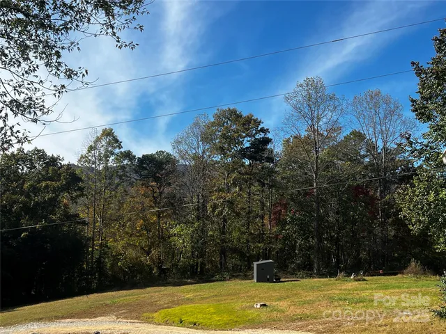 a view of a swimming pool with an outdoor space and seating area