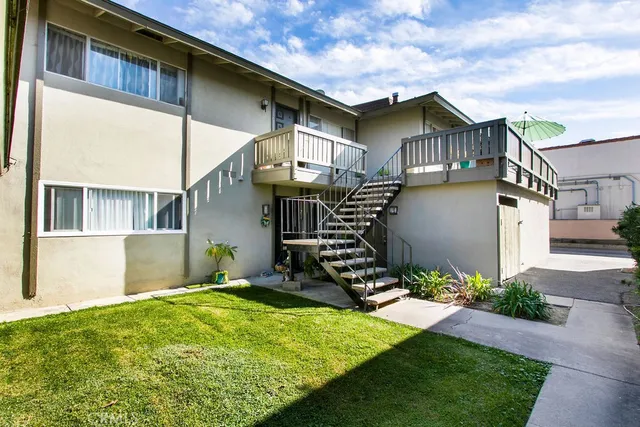 a house view with a garden space