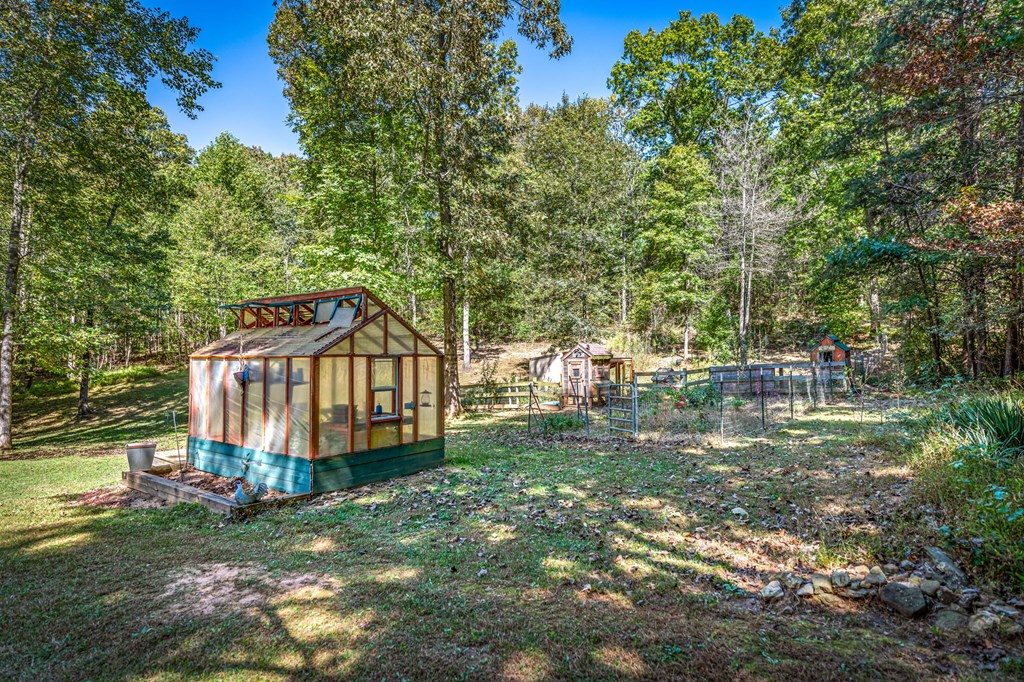 134 Ebenezer Road Ellijay, GA 30536 - Photo 73 of 85 Greenhouse and garden area