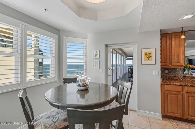 a spacious bedroom with a bed and a window