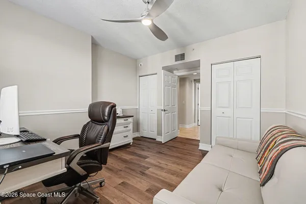 a kitchen with granite countertop a sink stainless steel appliances and cabinets