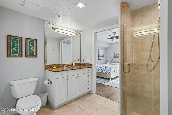 a group of people sitting outside of a building