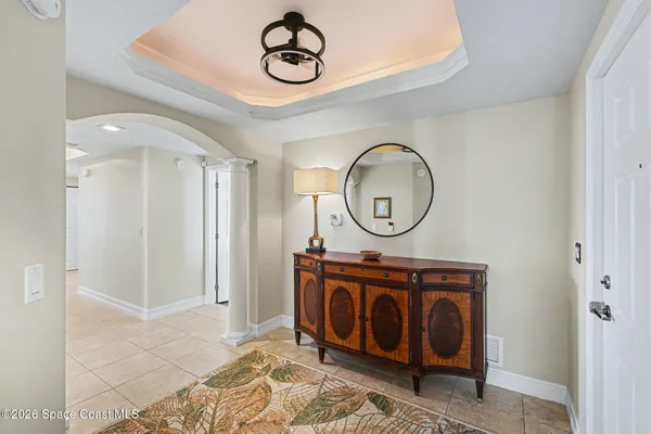 a kitchen with stainless steel appliances granite countertop a refrigerator a sink a stove and island