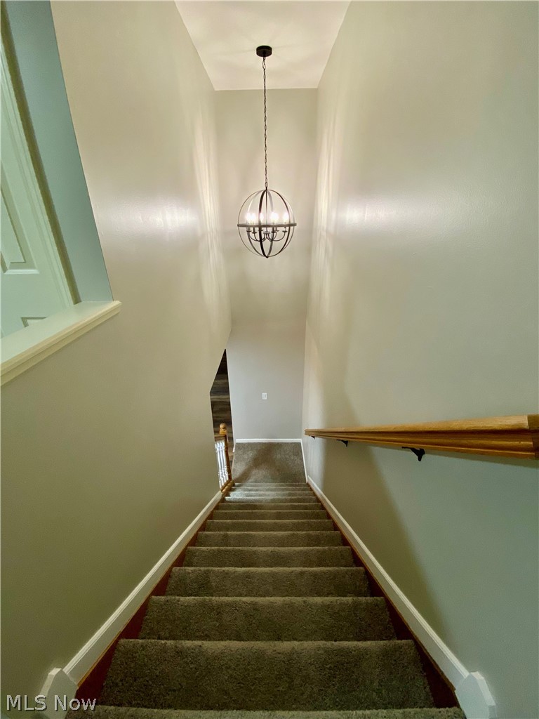 4407 Archer Road Cleveland, OH 44105 - Photo 9 of 34 Stairway with decorative lighting