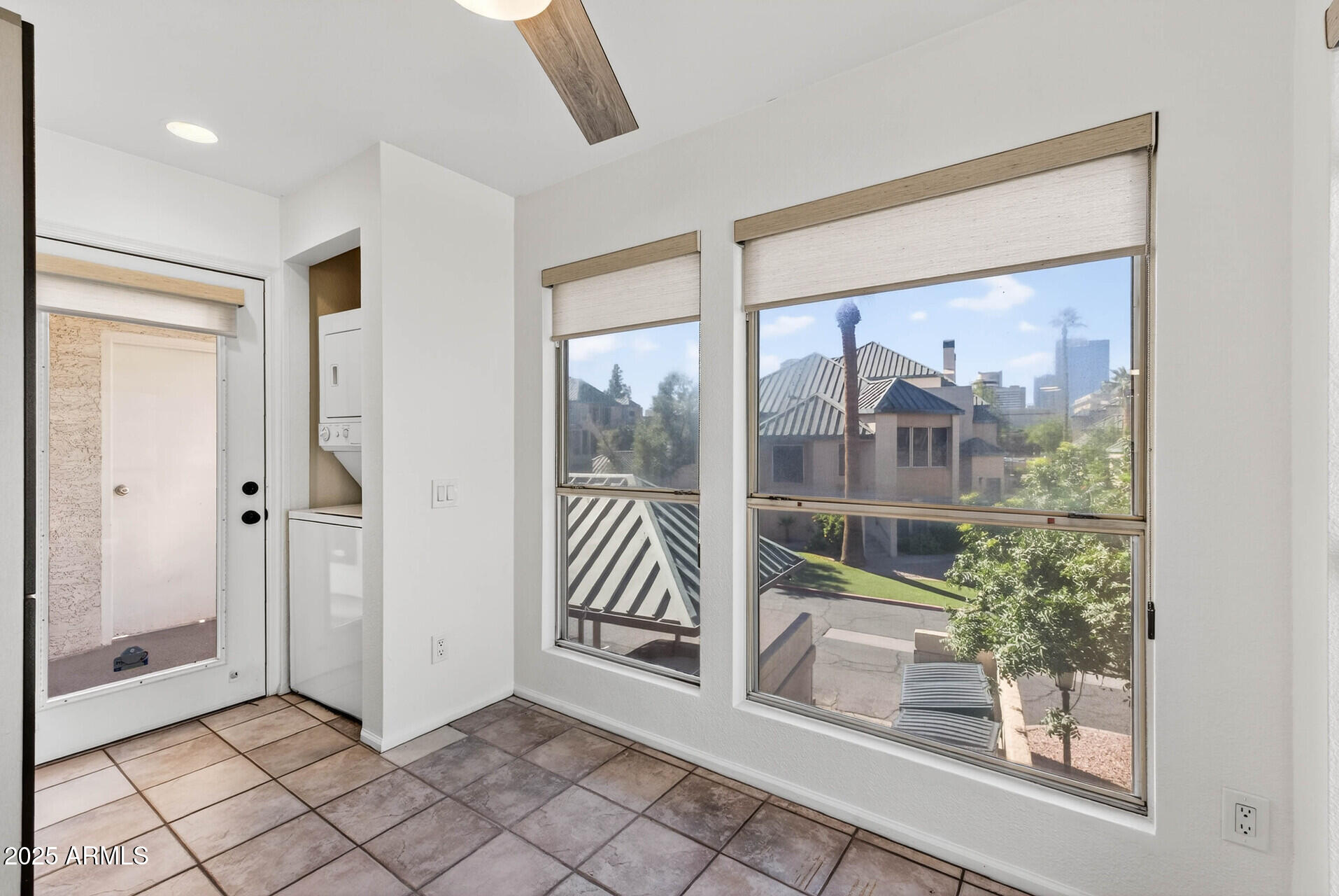 101 North 7th Street, Unit 245 Phoenix, AZ 85034 - Photo 16 of 37 a view of an entryway with wooden floor and door