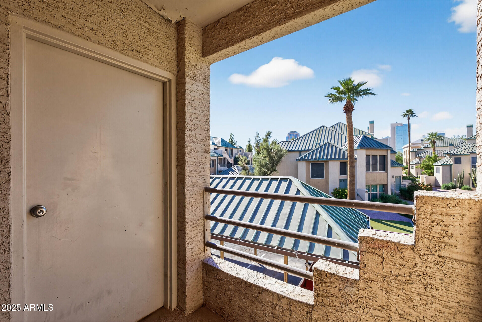 101 North 7th Street, Unit 245 Phoenix, AZ 85034 - Photo 20 of 37 a view of a balcony with chairs