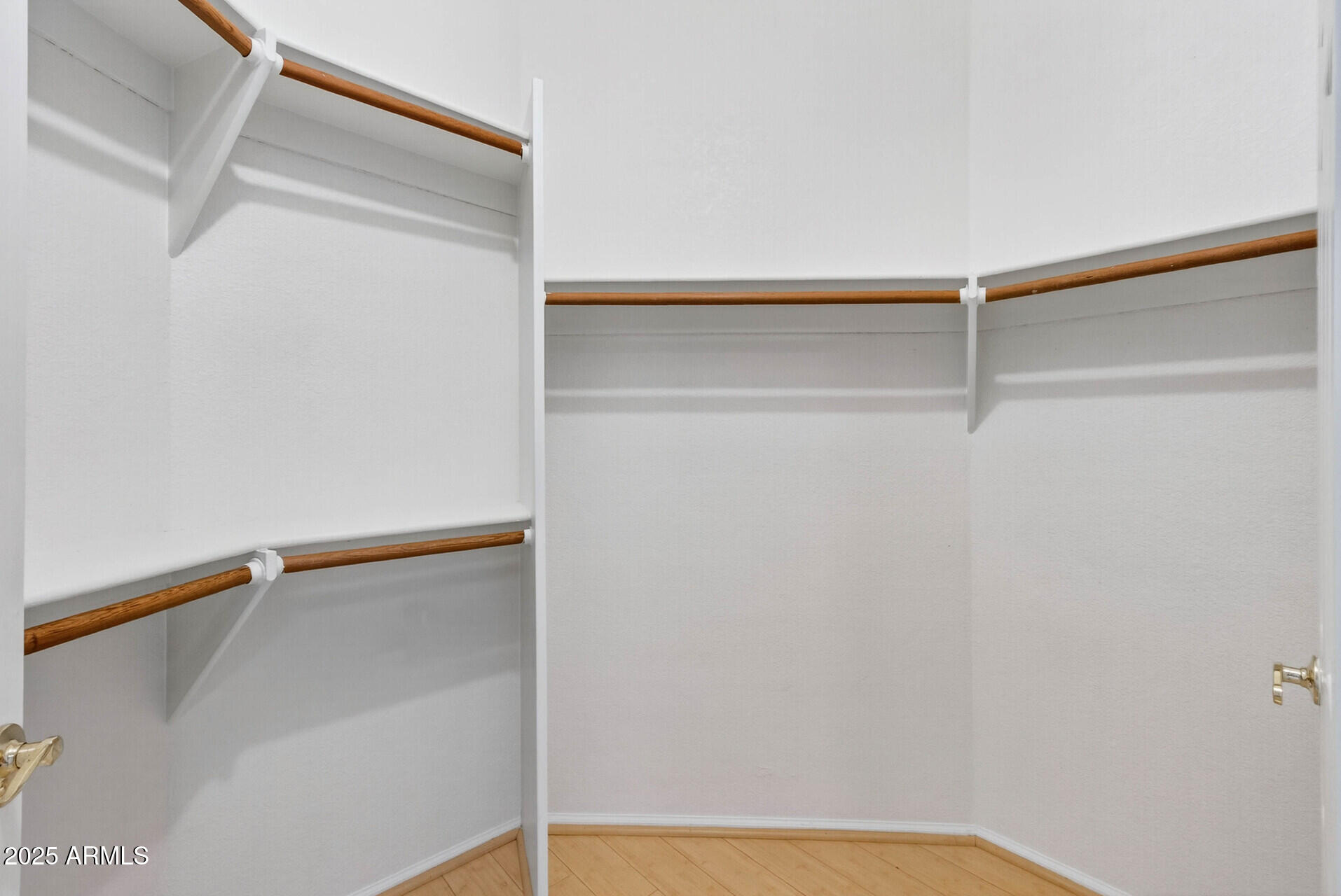 101 North 7th Street, Unit 245 Phoenix, AZ 85034 - Photo 24 of 37 a view of walk in closet with empty racks