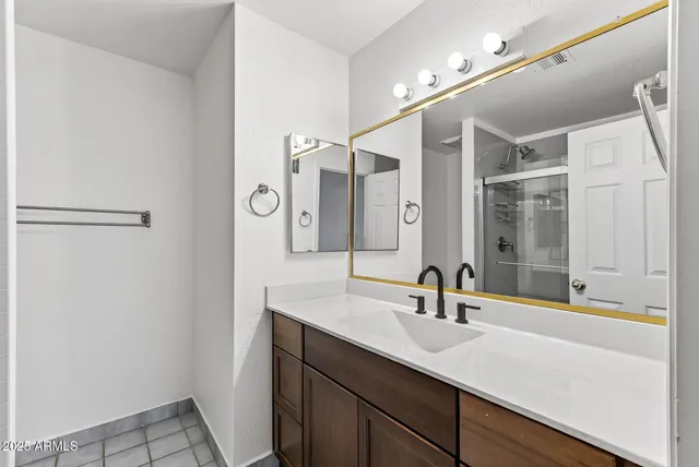 a bathroom with a shower and a toilet