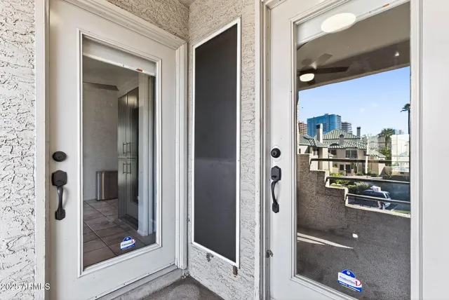 a view of balcony with furniture