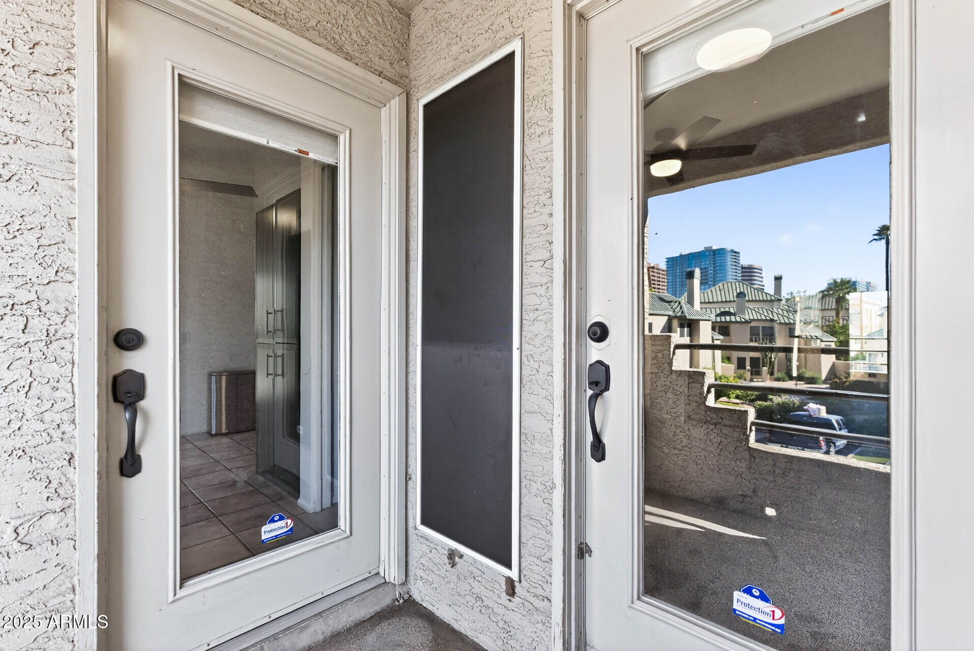101 North 7th Street, Unit 245 Phoenix, AZ 85034 - Photo 30 of 37 a view of a walk in closet and living room