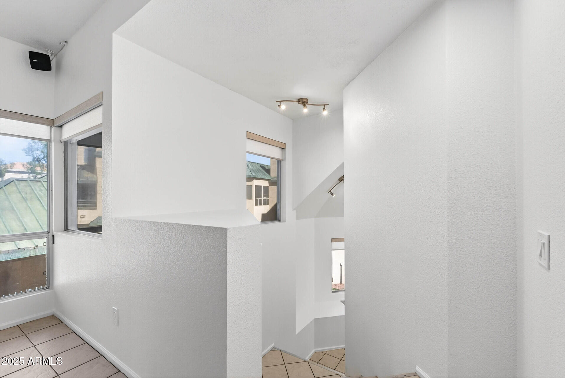 101 North 7th Street, Unit 245 Phoenix, AZ 85034 - Photo 7 of 37 a view of a hallway with bathroom and shower