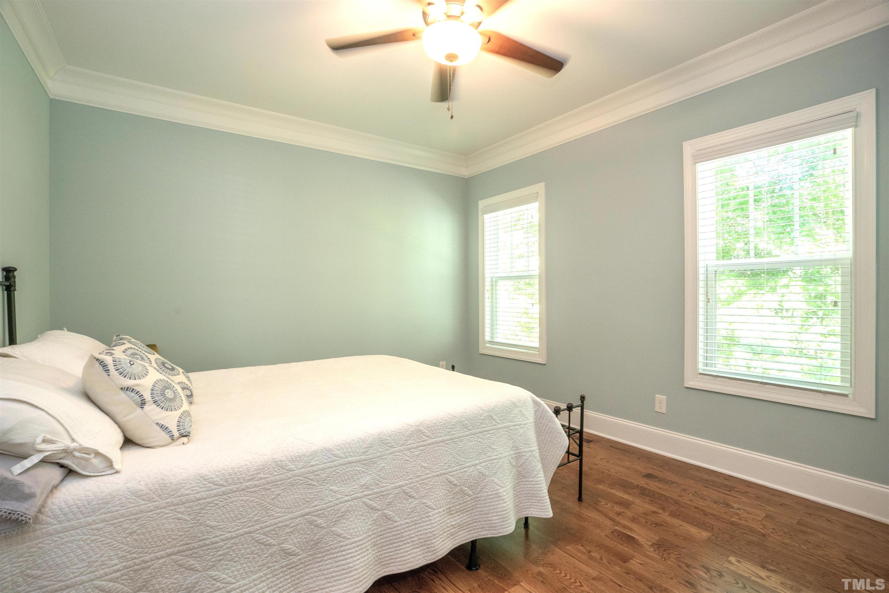 232 Bayleaf Drive Raleigh, NC 27615 - Photo 16 of 26 a bedroom with a bed and a window