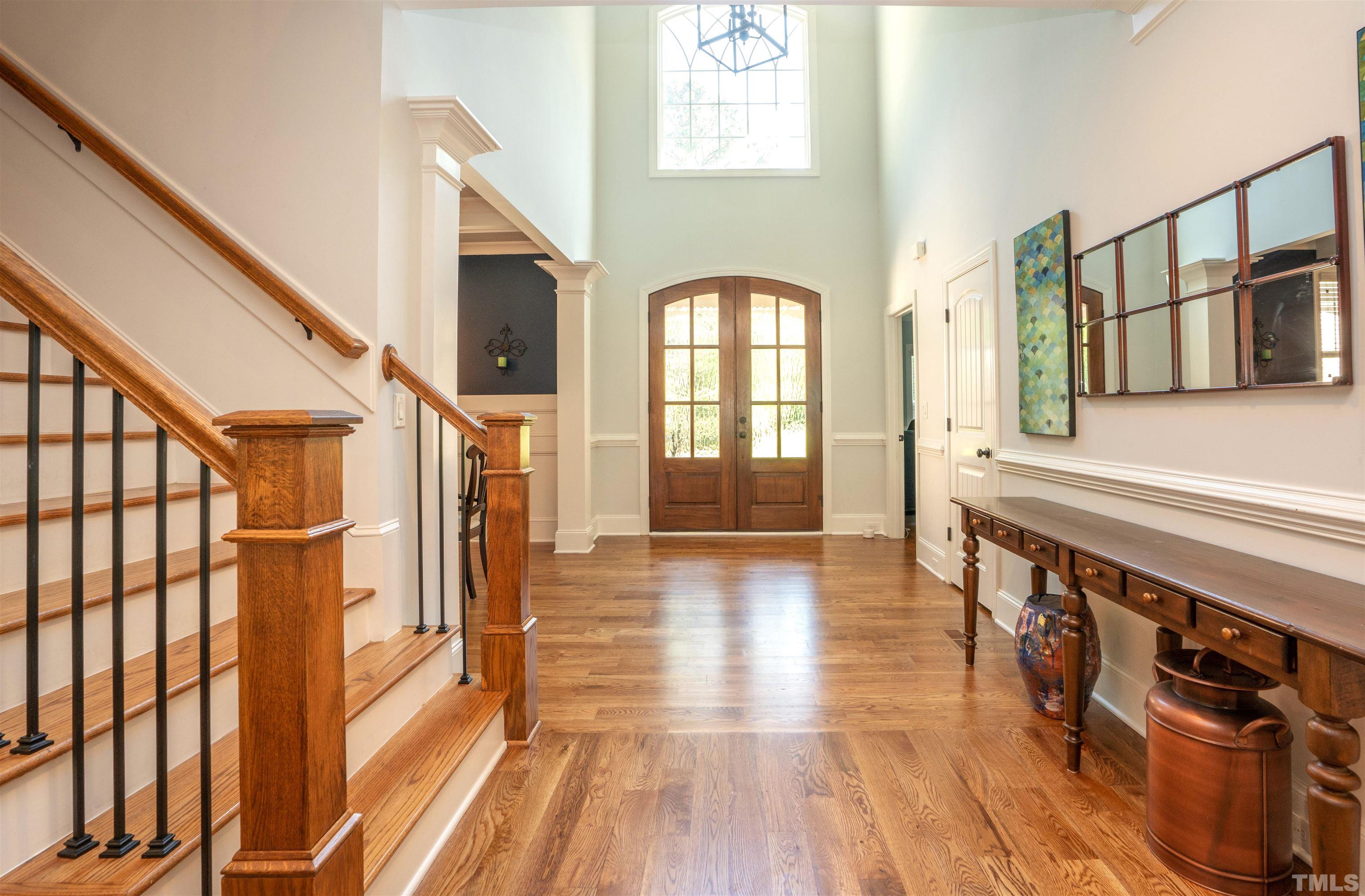 232 Bayleaf Drive Raleigh, NC 27615 - Photo 2 of 26 a view of an entryway with wooden floor