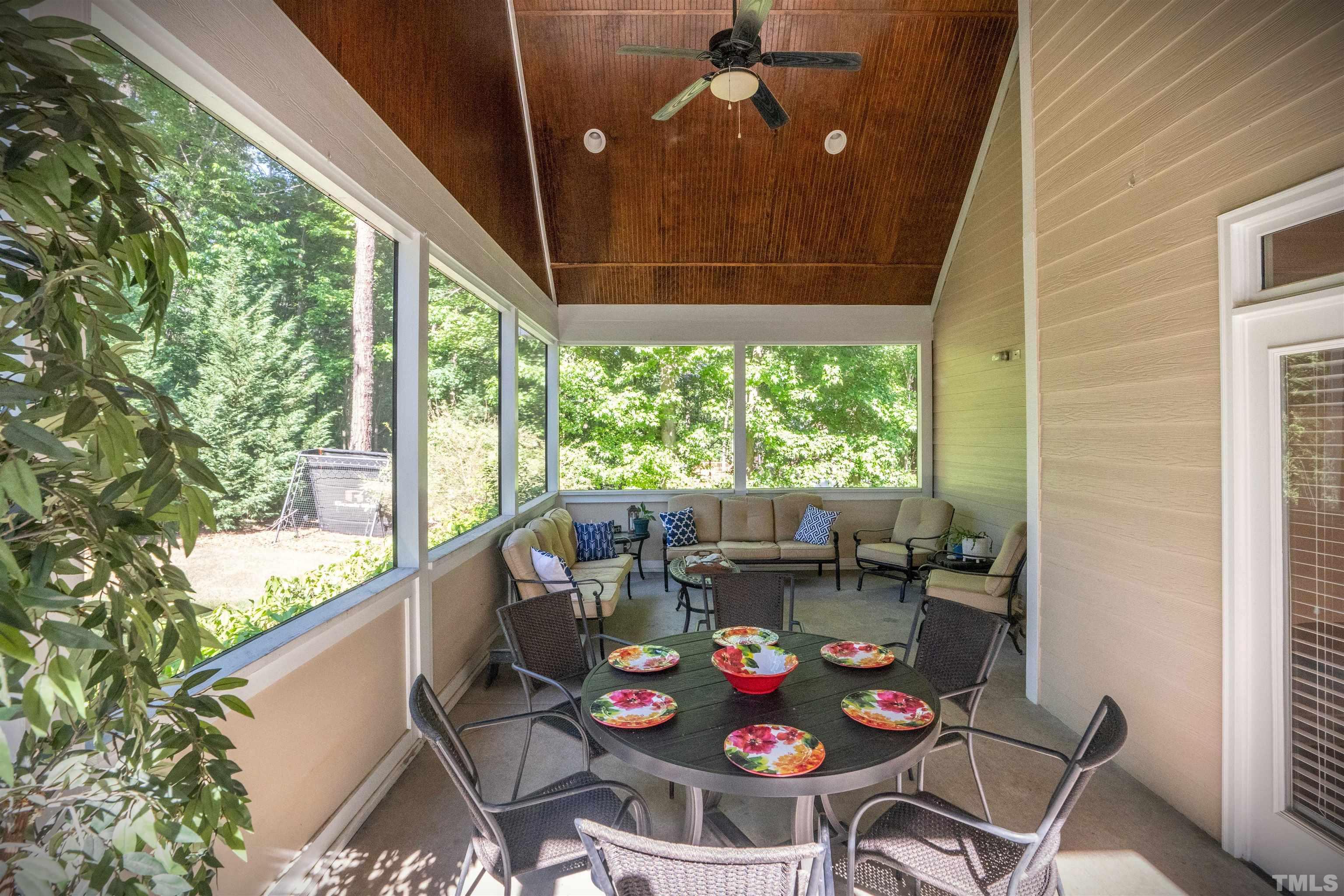 232 Bayleaf Drive Raleigh, NC 27615 - Photo 19 of 26 a view of a dining room with furniture window and outside view