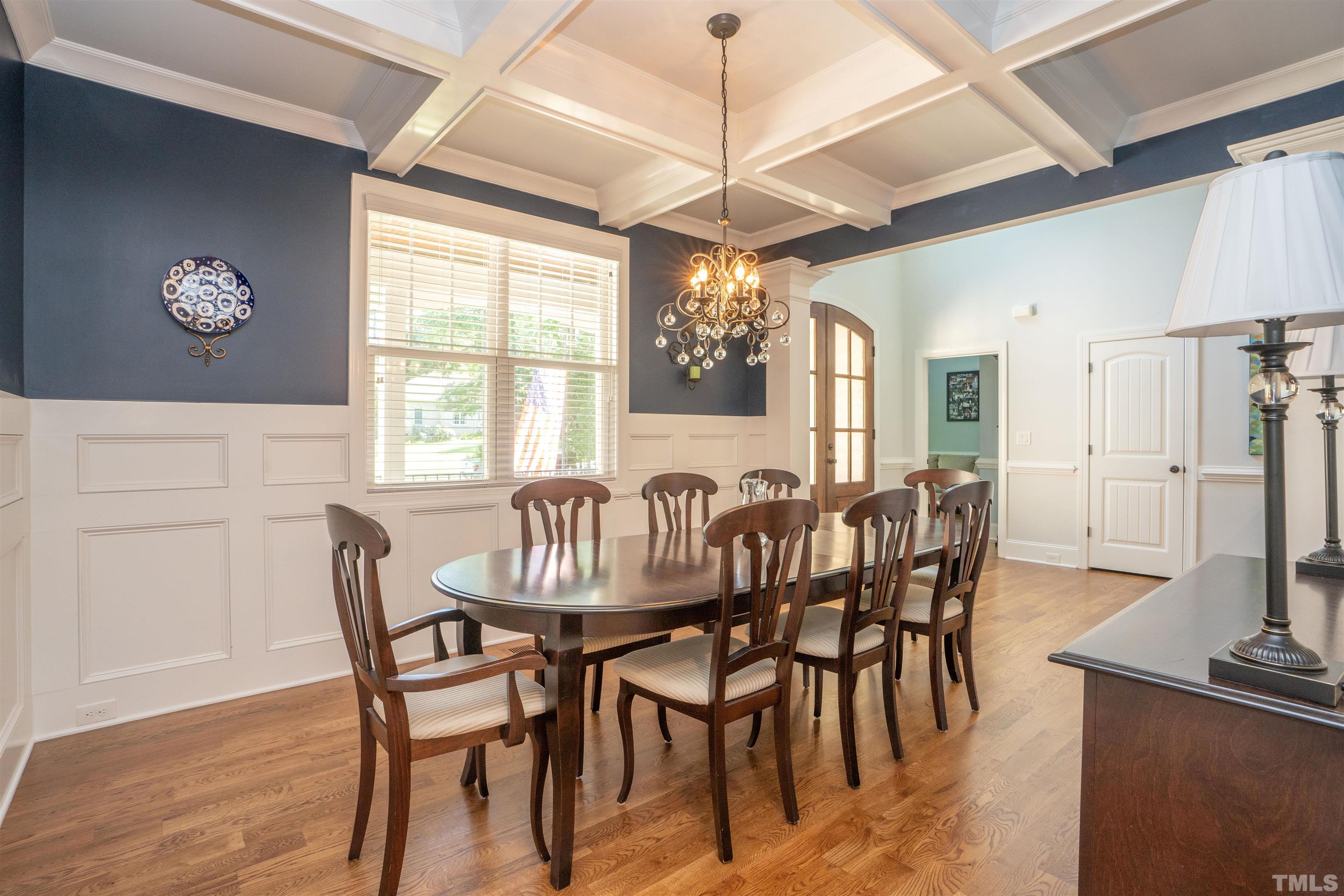 232 Bayleaf Drive Raleigh, NC 27615 - Photo 4 of 26 a view of a a dining room with furniture window and wooden floor