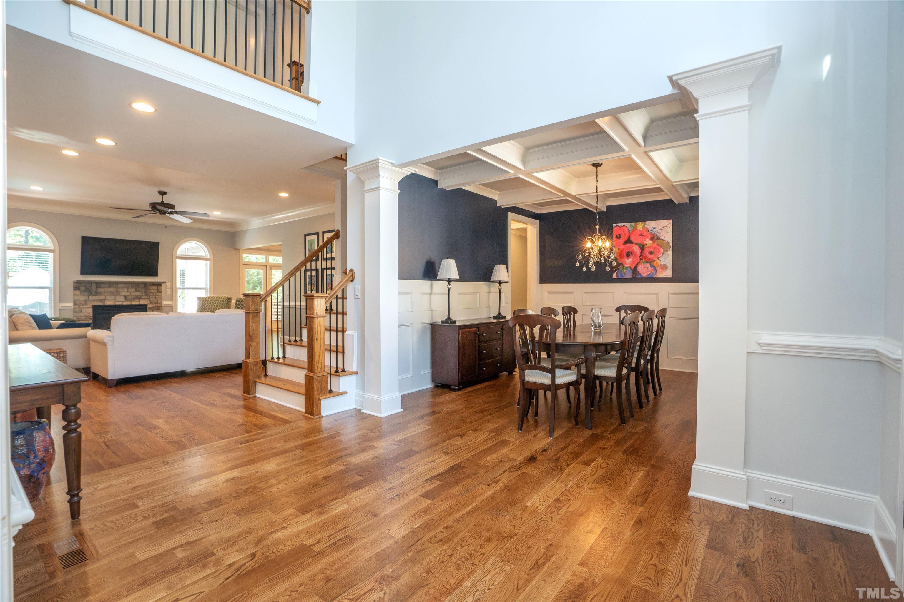 232 Bayleaf Drive Raleigh, NC 27615 - Photo 6 of 26 a living room with furniture and a flat screen tv