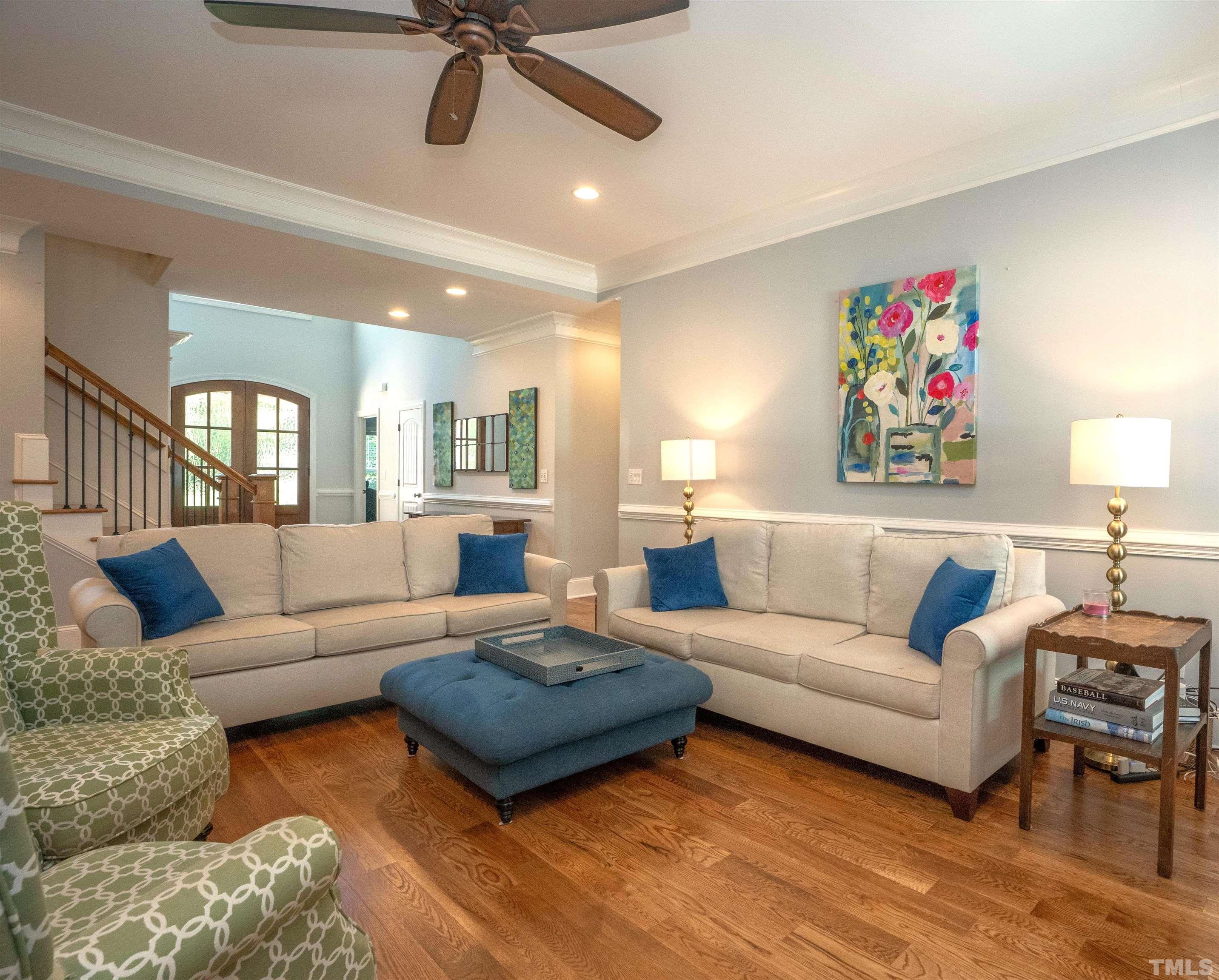 232 Bayleaf Drive Raleigh, NC 27615 - Photo 7 of 26 a living room with furniture and a view of kitchen