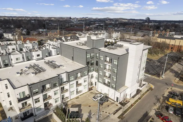 a picture of city view with lake view and boat