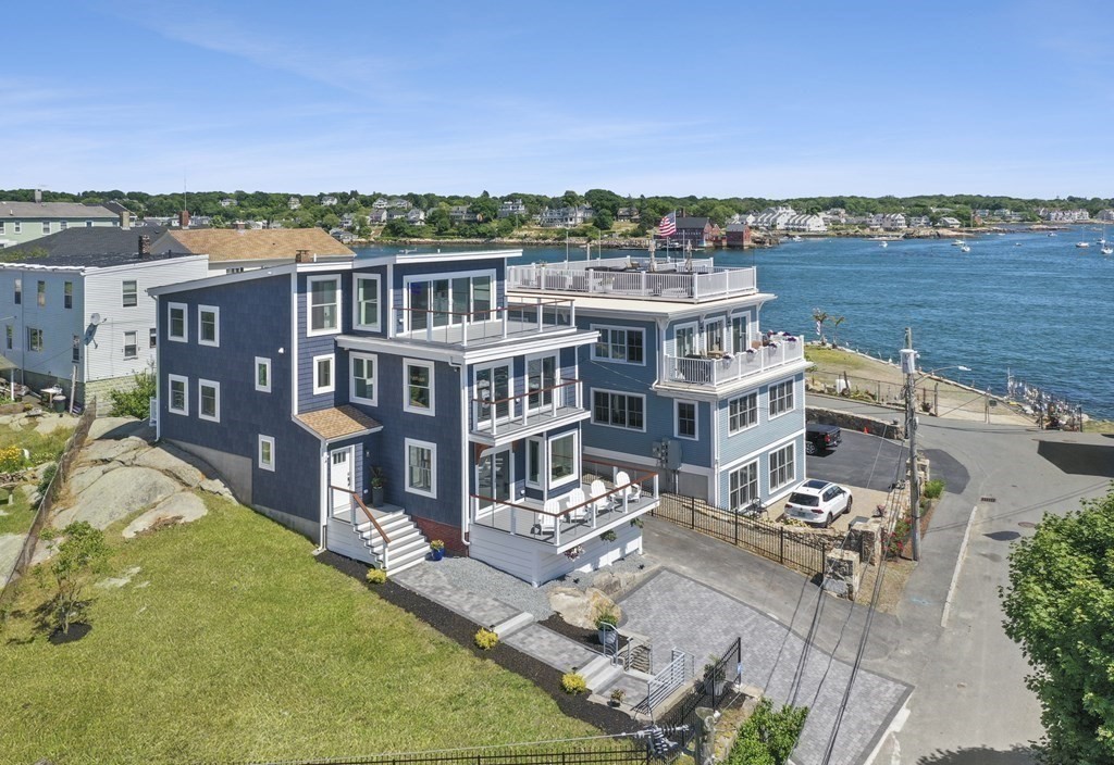a view of a lake with building in front of it
