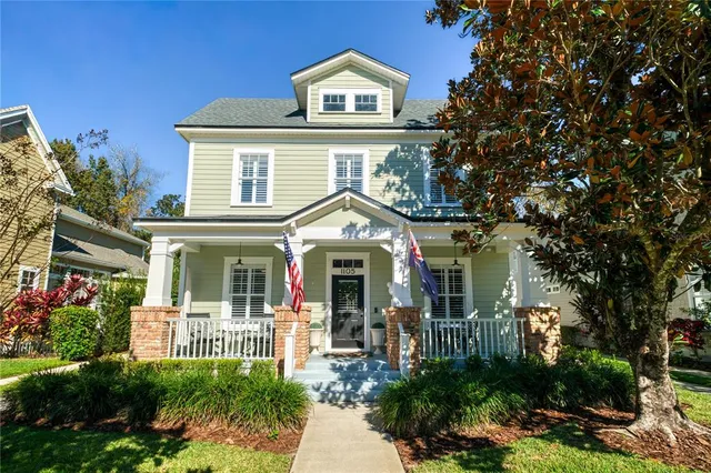 front view of a house with a small yard