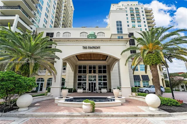 a view of a building with a garden