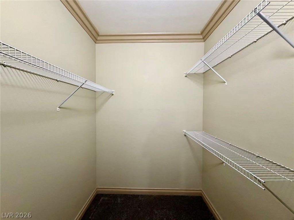 5525 West Flamingo Road, Unit 1019 Las Vegas, NV 89103 - Photo 12 of 18 Ample storage solutions define this practical closet space.