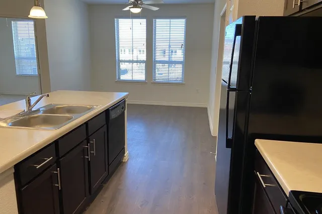 a bathroom with a sink a vanity and a mirror