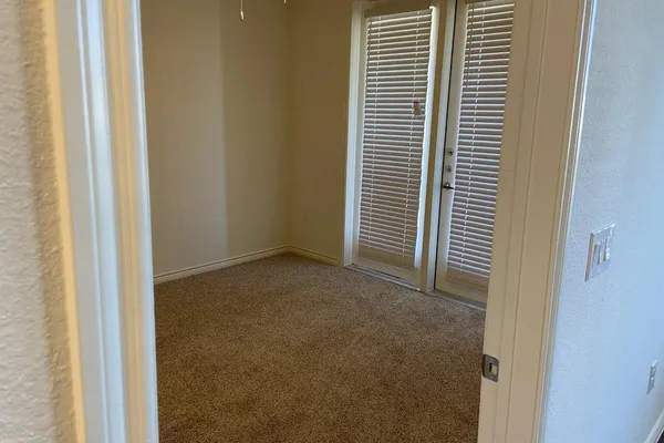 a view of a room that has a window in it