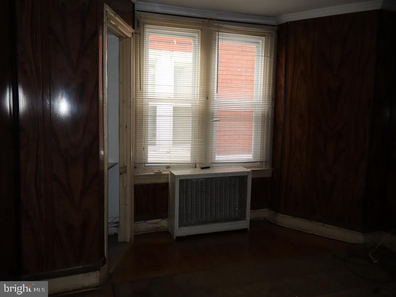 1502 68th Avenue Philadelphia, PA 19126 - Photo 12 of 20 a bathroom with a sink and a window