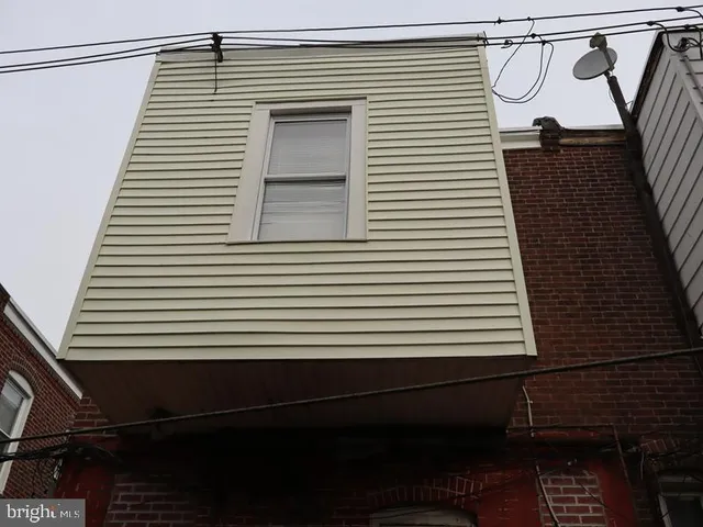 a view of a balcony with a door