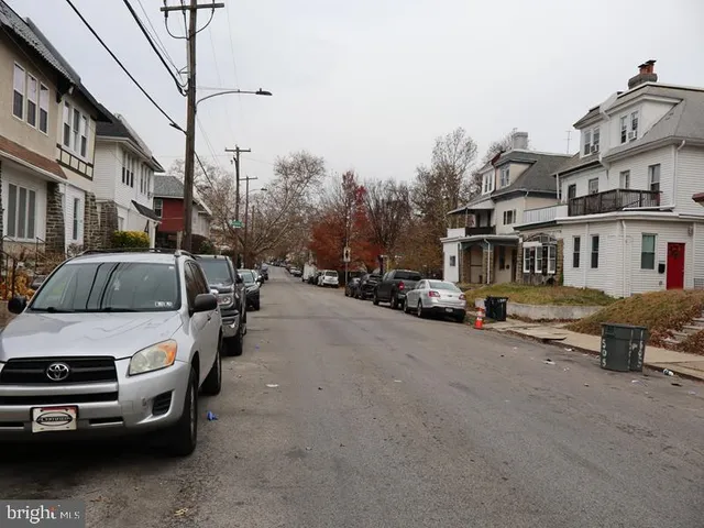 a view of a street with cars