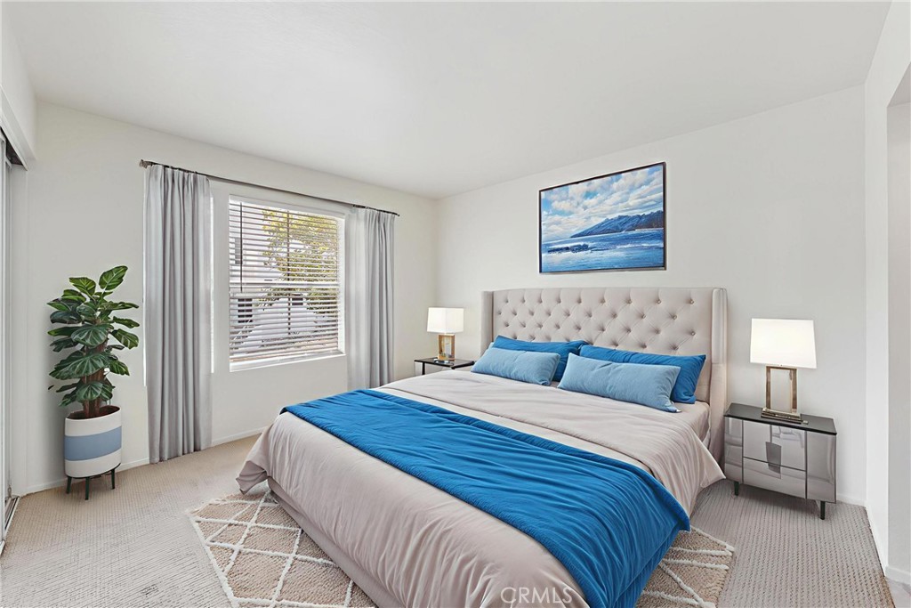 14 Abrigo Rancho Santa Margarita, CA 92688 - Photo 15 of 35 a bedroom with a bed and a window