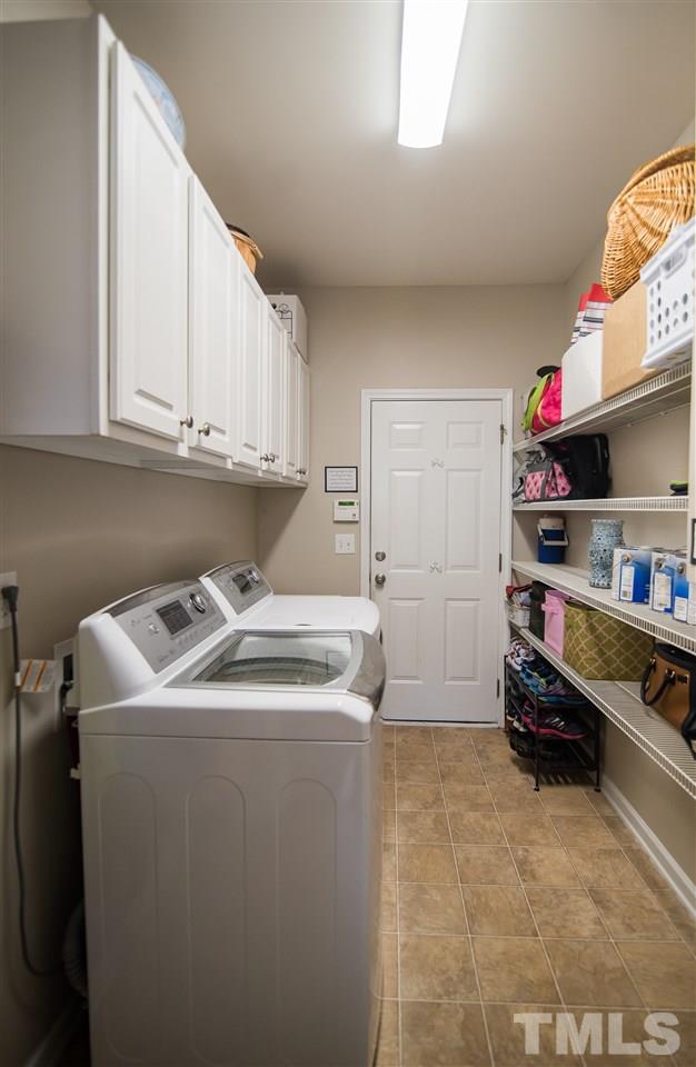 2307 Bright Future Way Raleigh, NC 27614 - Photo 11 of 23 Large laundry room with plenty of extra storage!
