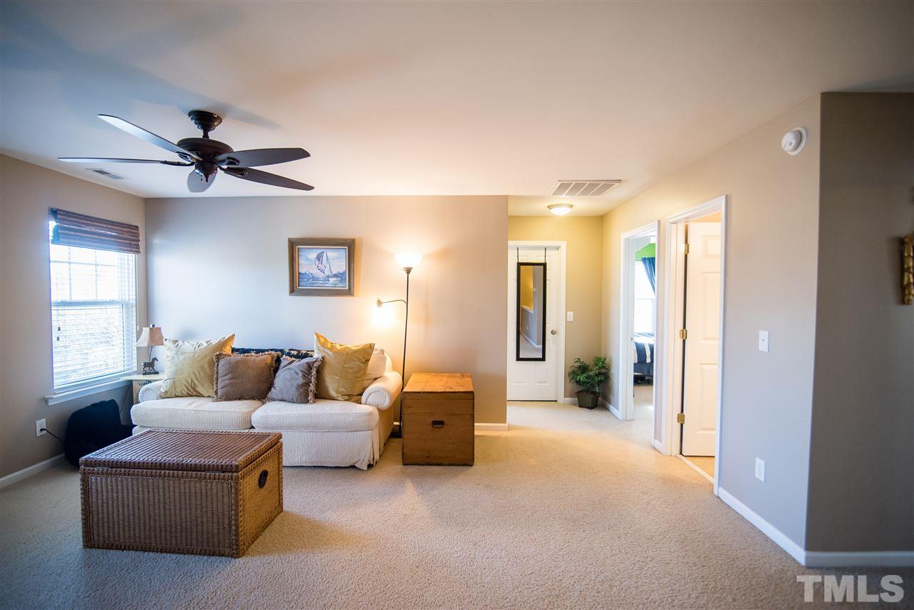 2307 Bright Future Way Raleigh, NC 27614 - Photo 12 of 23 Cozy bonus room can be used as a second family room or playroom.
