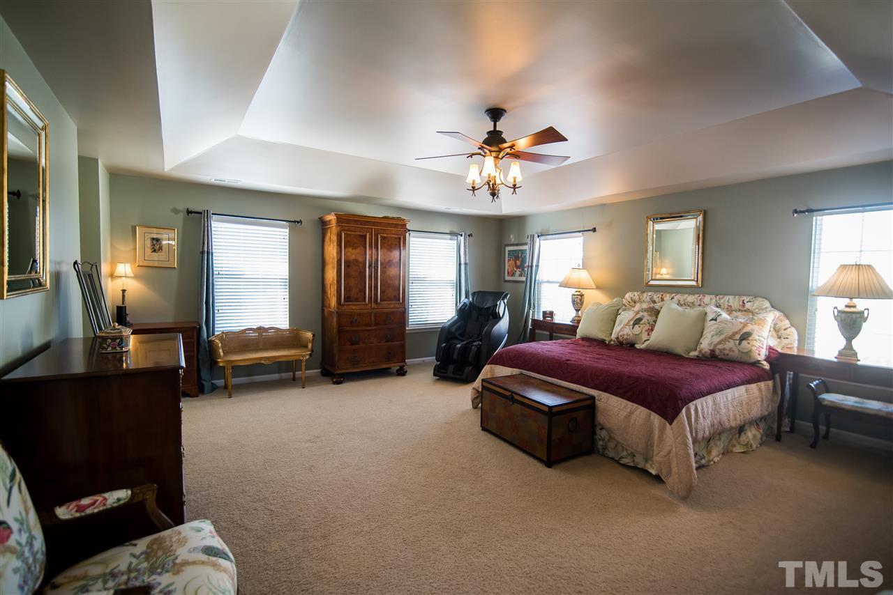 2307 Bright Future Way Raleigh, NC 27614 - Photo 14 of 23 You'll never want to get out of bed when you're in this master bedroom retreat!