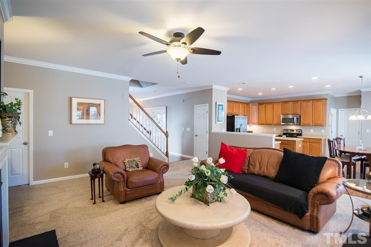 2307 Bright Future Way Raleigh, NC 27614 - Photo 6 of 23 Never miss a moment with your family! The kitchen and family room are conveniently open to one another.