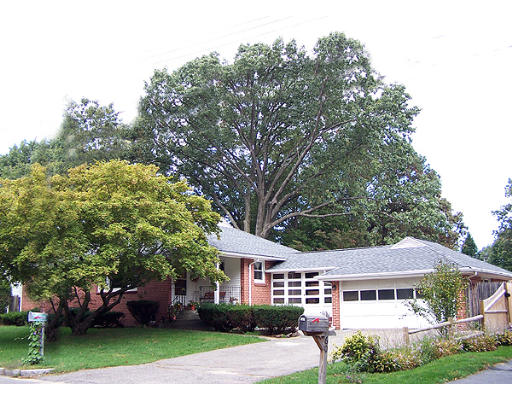 68 Hazen Street Springfield, MA 01119 - Photo 1 of 19 a front view of a house with a garden