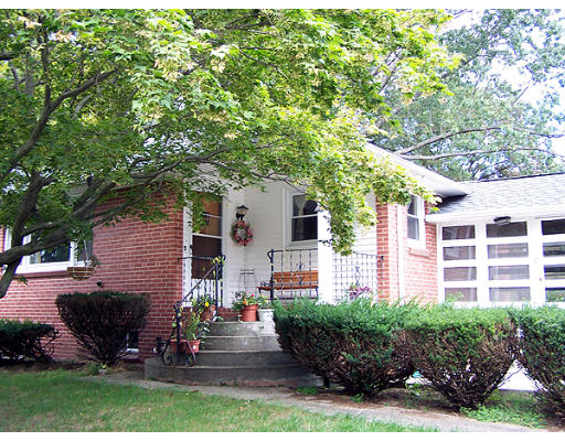 68 Hazen Street Springfield, MA 01119 - Photo 2 of 19 a front view of house with yard and green space