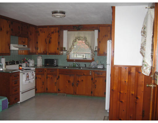 68 Hazen Street Springfield, MA 01119 - Photo 6 of 19 a kitchen with stainless steel appliances granite countertop a stove a sink and a refrigerator
