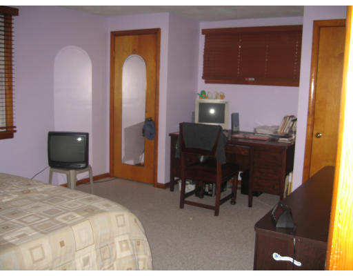 68 Hazen Street Springfield, MA 01119 - Photo 10 of 19 a bedroom with a bed and a desk