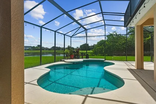 a view of a patio with a yard